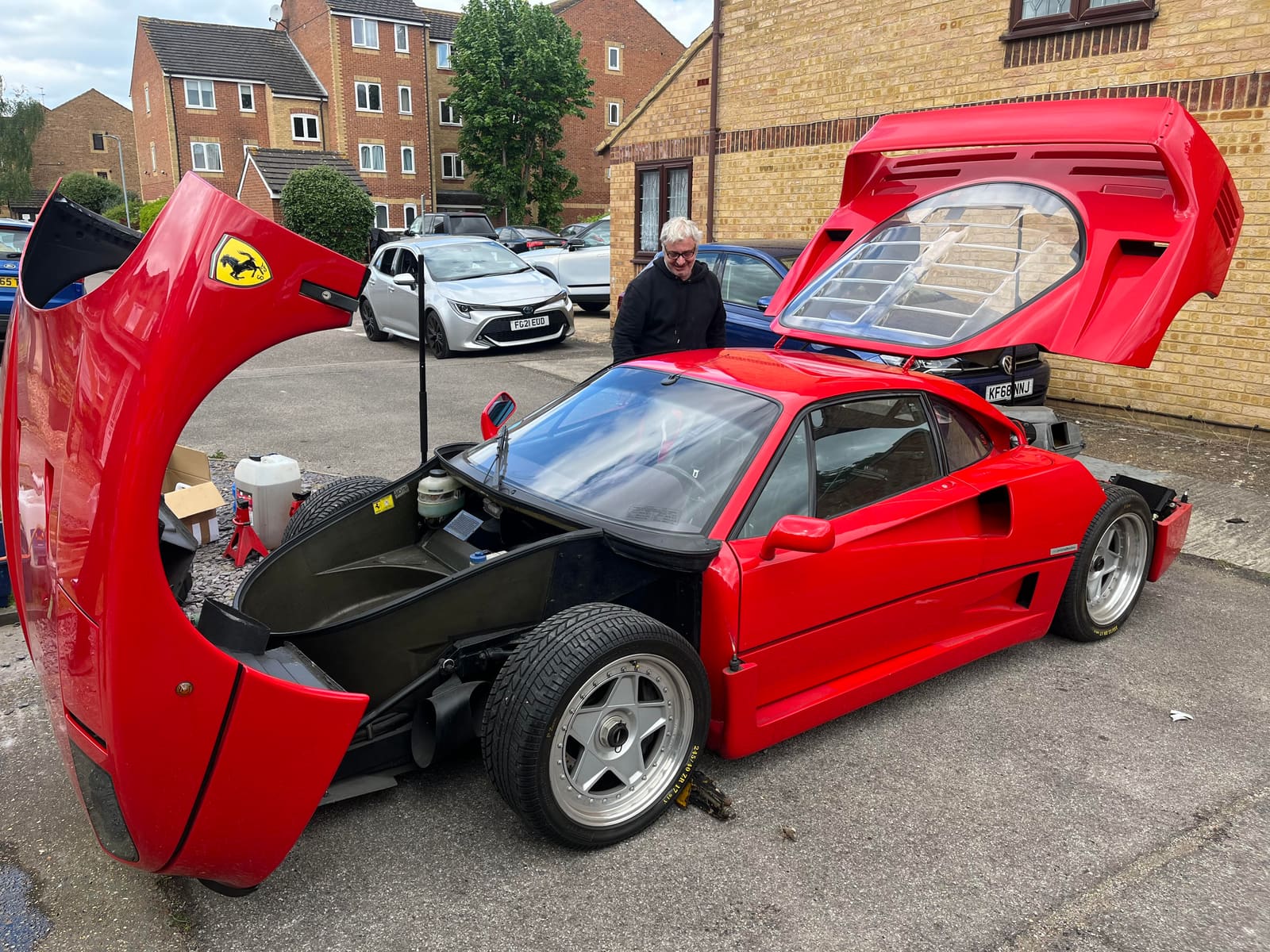 Ferrari F40 with doors up during servicing