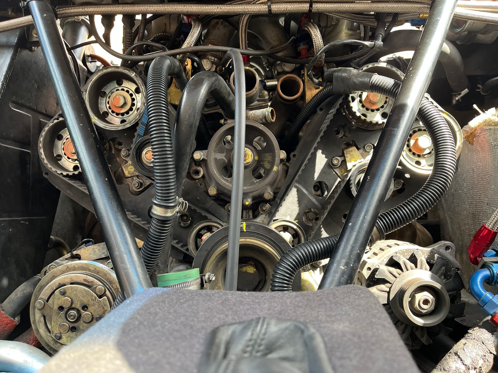 Close-up of timing belt and pulleys during engine work