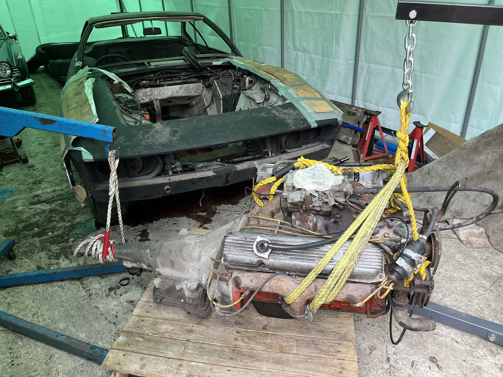 V8 engine and gearbox lifted clear of the shell